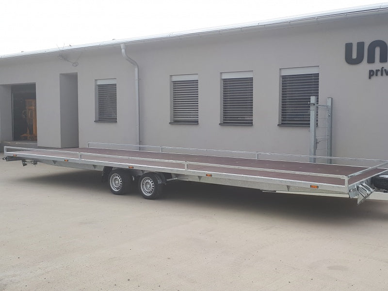 Prívesný vozík plato s kolesami pod plochou